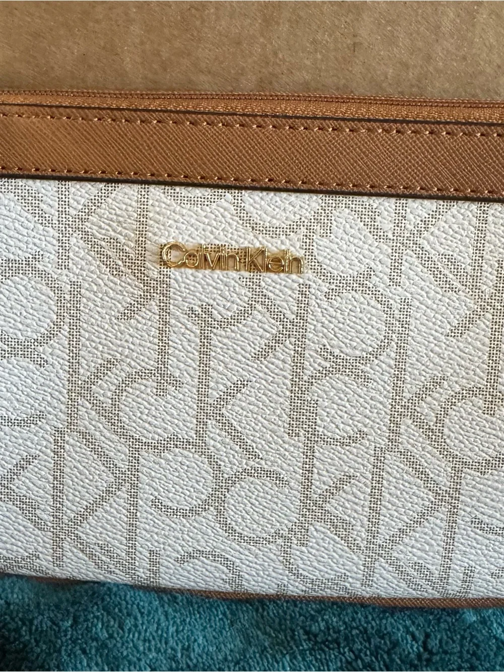 Calvin Klein White & Tan Logo wristlet with Gold Hardware